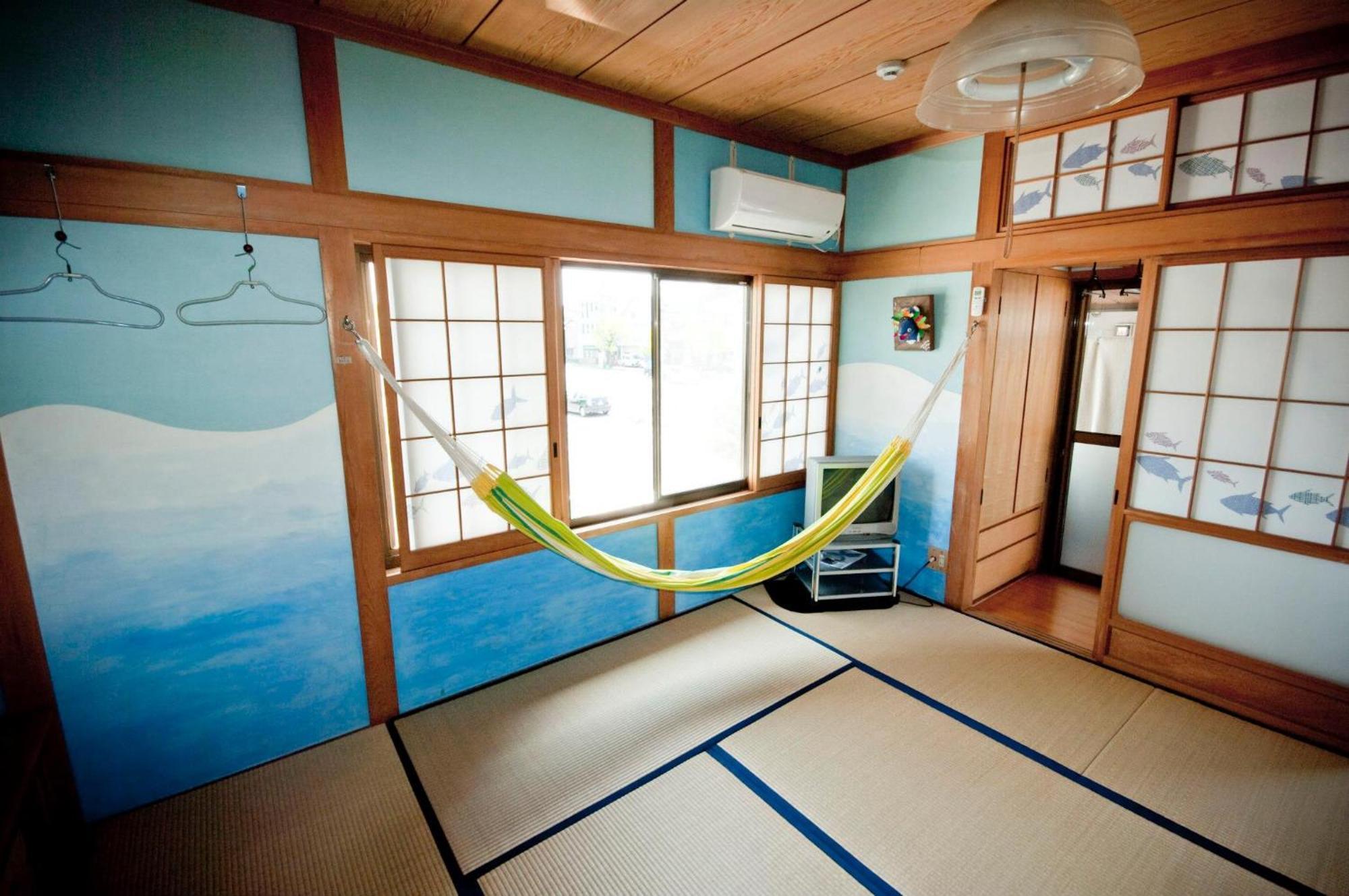 Katsuo Guest House Коти Номер фото
